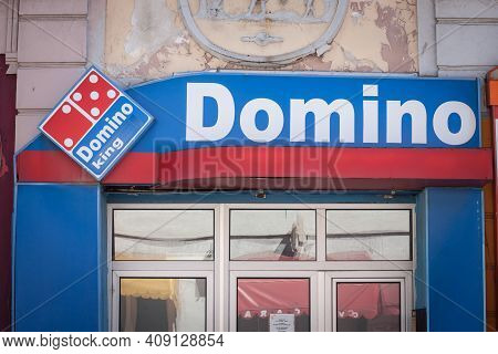 Vrsac, Serbia - August 2, 2020: Sign Of Domino King, A Fake Pizzeria Imitating Domino's Pizza, A Cha