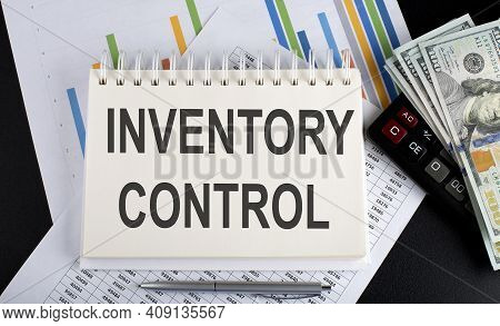 Inventory Control Text Written On Notebook With Chart,calculator And Dollars