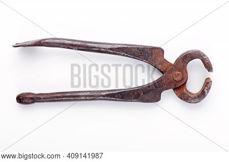 Old Pliers. Pastizzi On A White Plate Close-up.