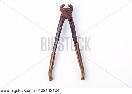 Old Pliers. Pastizzi On A White Plate Close-up.