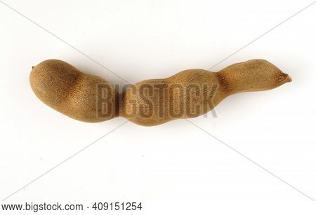 Tamarind Tree Produces Brown, Pod-like Fruits That Contain A Sweet, Tangy Pulp