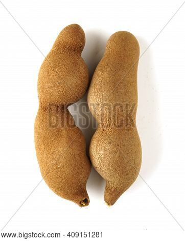 Tamarind Tree Produces Brown, Pod-like Fruits That Contain A Sweet, Tangy Pulp