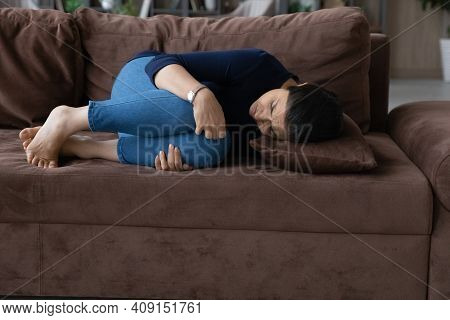 Unwell Indian Woman Lying Suffer From Stomachache