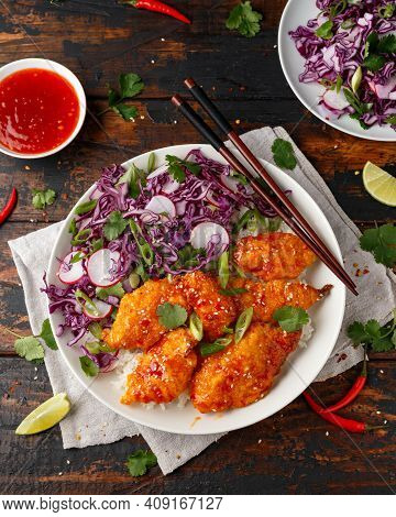 Korean Fried Chicken With Red Cabbage Salad And White Rice. Asian Food