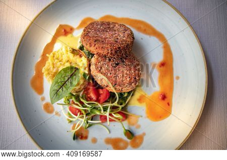 Elicious Burger With Sauce. Hamburger. Delicious Grilled Angus Burger With Cheese, Salad And Tomatoe