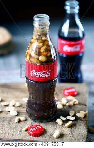 Coca Cola Bottles With Peanuts. Traditional American Snack.