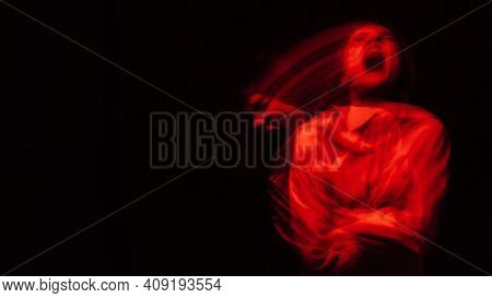 Blurry Portrait Of A Psychopathic Girl With Schizophrenic Mental Disorders