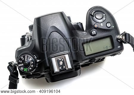 Photo Camera Isolated On White Background, Above View Of Professional Dslr Camera Body. Black Digita