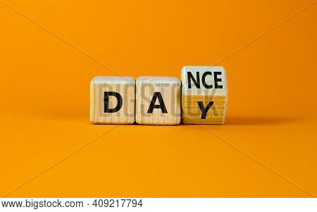 International Dance Day Symbol. Turned The Cube With Words 'dance Day'. Beautiful Orange Table, Oran