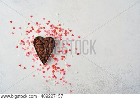 Cooking Background With Cookie Cutters And Coffee Beans, Pink Sugar Sprinkling On Gtay Background. S