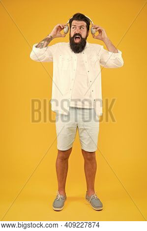 Its Too Loud. Shouting Bearded Man In Headphones Listening To Music. Mature Hipster With Beard. Dj I