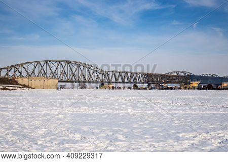 Tczew, Poland - February 21, 2021: The Historic Bridge Over The River Vistula In Tczew. Winter Lands
