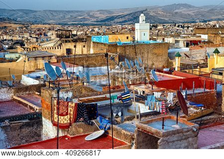 View Of The Old Buildings Roofs In Medina Quarter Of Fez In Morocco. The Medina Of Fez Is Listed As 