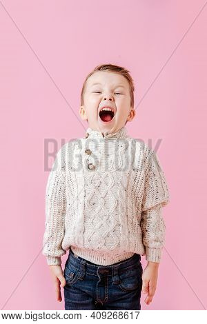 Playful Boy Standing Stiff And Tight, Mouth Open Wide, Shoulders Raised