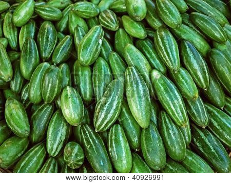Vegetable, Seven Striped pear gourds Parwal at street market Indore, Madhya Pradesh, India
