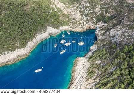 Aerial Drone Shot Of Iconic Stiniva Cove Beach Of Adriatic Sea On Vis Island In Croatia Summer