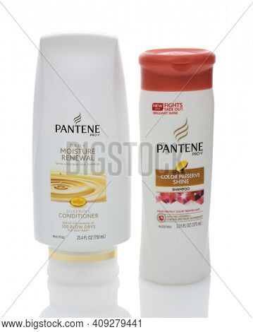 IRVINE, CA - DECEMBER 12, 2014: Two bottles of Pantene Hair Care Products. Introduced in Europe in 1947 by Hoffmann-La Roche of Switzerland, the name based on panthenol as a shampoo ingredient.