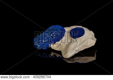 Macro Mineral Stone Azurite In Siltstone Against Black Background