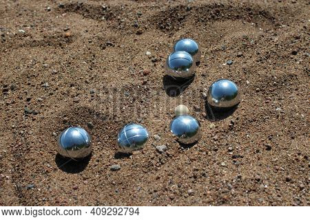 The Petanque Leisure Game On The Beach