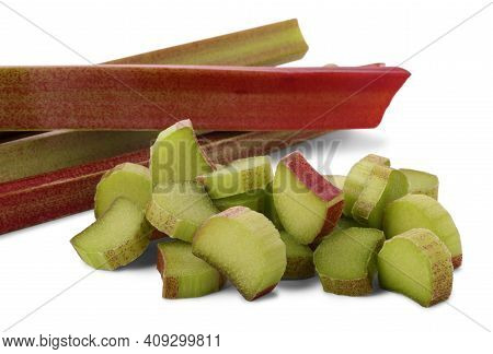 Cut Pieces Of Rhubarb (rheum Rhaponticum) Isolated On White Background. Cultivated Plant, Which Eate