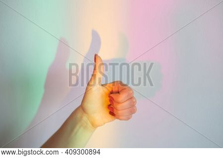 Hands Shadow Game. Funny Gesture. Imagine Play. Home Theater. Female Showing Like With Thumb Up Refl
