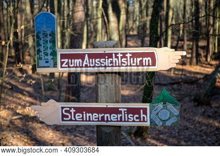 Rauen, Brandenburg, Germany - February 21, 2021 Sign In The Forest - Shows The Direction To Margrafe