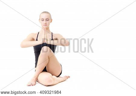 Young Blond Hair Woman In Yoga Pose Gomukhasana Or The Cow Face Pose Isolated On White Background