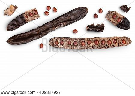 Ripe Carob Pods And Bean Isolated On White Background With Clipping Path. Top View With Copy Space F