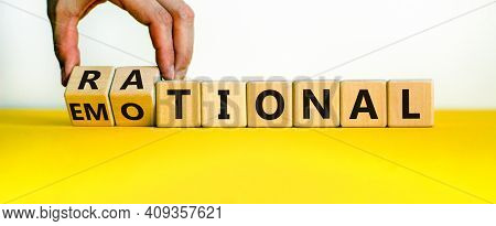 Rational Or Emotional Symbol. Psychologist Turns Wooden Cubes And Changed The Word 'rational' To 'em