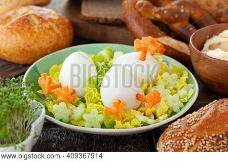 Easter Breakfast With Hard Boiled Eggs And Bread Rolls