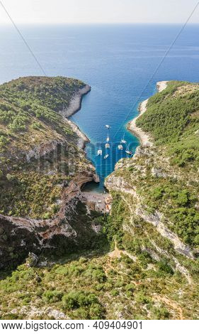 Aerial Drone Shot Of Iconic Stiniva Cove Beach Of Adriatic Sea On Vis Island In Croatia Summer