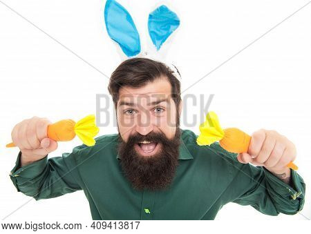 Feeling Excited. Funny Man In Rabbit Ears. Easter Man Hold Carrot Isolated On White. Bunny Hunt. Jus