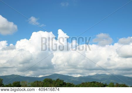 Mountains Green Grass And Blue Sky Landscape