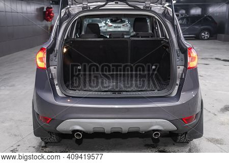 Novosibirsk, Russia - February 18 2021: Ford Kuga, Close-up Of The Open Trunk, Headlight, Bumper,  F