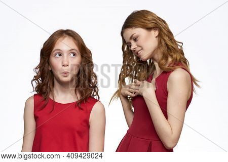 Mom And Daughter Red Dress Hug Family Joy Friendship