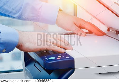 Business Man Hand Press Button Printer Panel To Make A Copy Of The Document In The Office. Multifunc