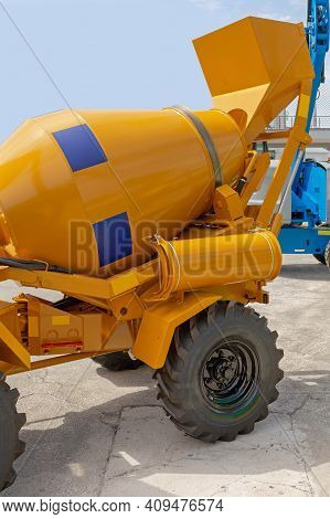 Self Loading Cement Mixer Vehicle At Construction Site