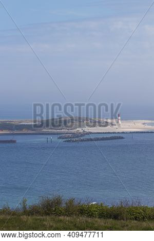 Houses And Alleys On The Island Of Helgoland With A View Of The Landscape And The Background Of The 