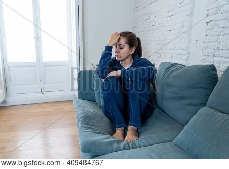 Young Sad Woman Suffering From Depression Feeling Lonely And Hopeless Isolated At Home