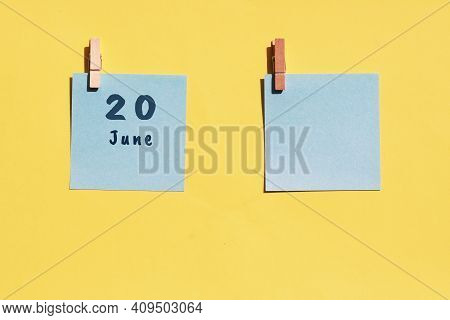 June 20st . Day Of 20 Month, Calendar Date. Two Blue Sheets For Writing On A Yellow Background. Top 