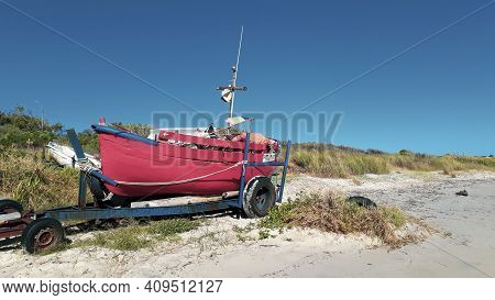 Fishing Boat Parked At Sand