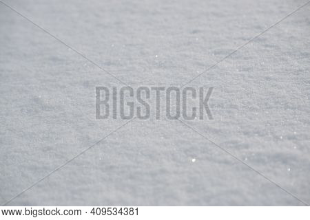 White Frosen Snow Surface  As A Background.
