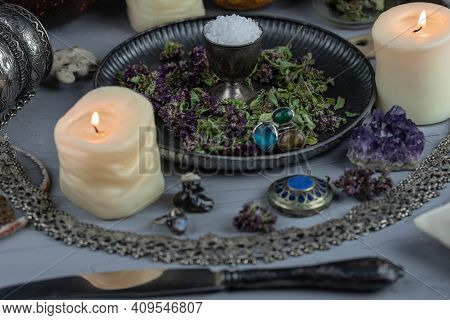 Magic Altar With Mystical Herbs, Salt, Candles And Crystals. Witch Sanctuary Sacred Esoteric Concept