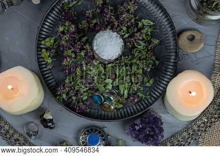 Magic Altar With Mystical Herbs, Salt, Candles And Crystals. Witch Sanctuary Sacred Esoteric Concept