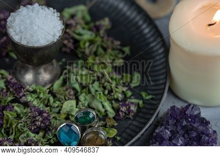 Magic Altar With Mystical Herbs, Salt, Candles And Crystals. Witch Sanctuary Sacred Esoteric Concept