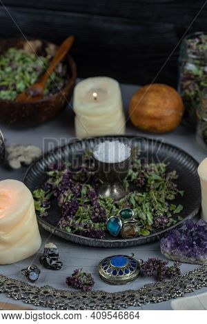 Magic Altar With Mystical Herbs, Salt, Candles And Crystals. Witch Sanctuary Sacred Esoteric Concept