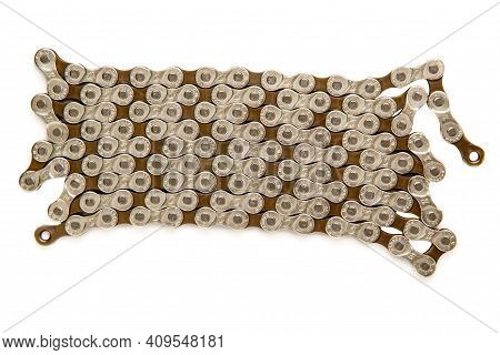 Krasnodar, Russia - February 12, 2021:8-speed M-wave Bicycle Chain Isolated On White Background