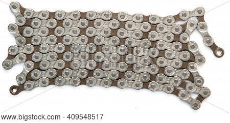 Krasnodar, Russia - February 12, 2021: New M-wave 8-speed 116-link Bicycle Chain Isolated On White B