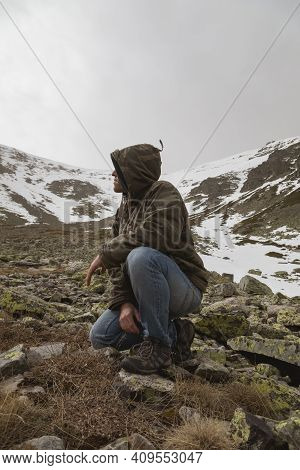 Stock Photo Of A Man Wearing Camouflage Clothing, And Trekking In The High Mountain Of Moncayo In Ar