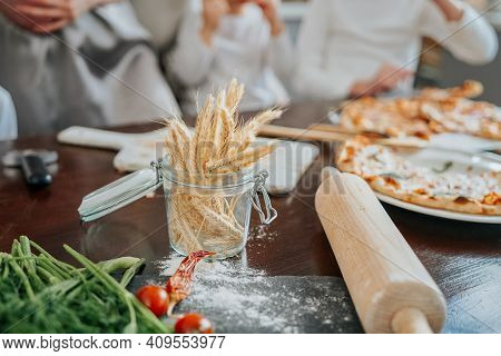 Ogranic And Healthy Food And Vegetables. Rolling Pin With Flour On The Table In Modern Kitchen In Da